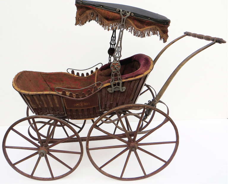 antique wooden baby carriage
