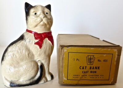 "Cat With A Bow Seated" Still Bank. American, Circa 1970