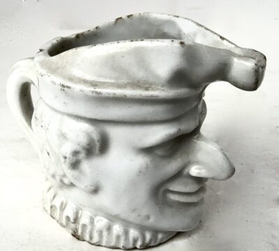 Porcelain "Punch" Figural Diminutive Creamer England, Circa 1865.  RARE